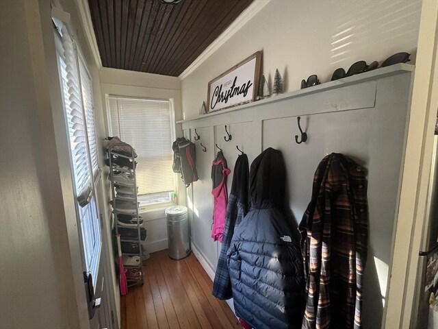 mudroom with hardwood / wood-style flooring and crown molding