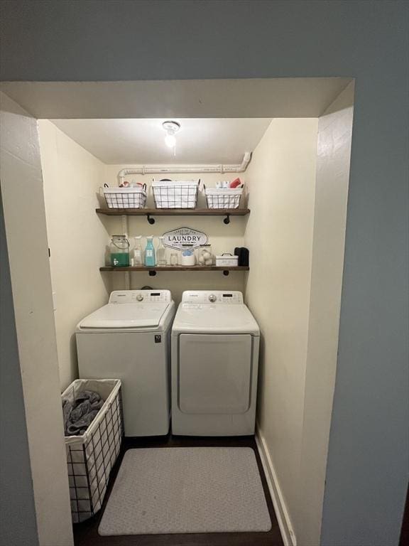 washroom featuring washer and dryer