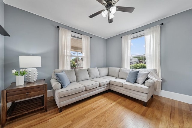 30 Edge Hill Rd, Lynn, MA 01904 - living area featuring baseboards, plenty of natural light, light wood-style flooring, and ceiling fan