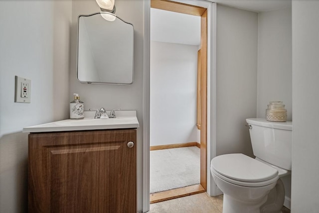 30 Edge Hill Rd, Lynn, MA 01904 - bathroom featuring vanity, toilet, and baseboards