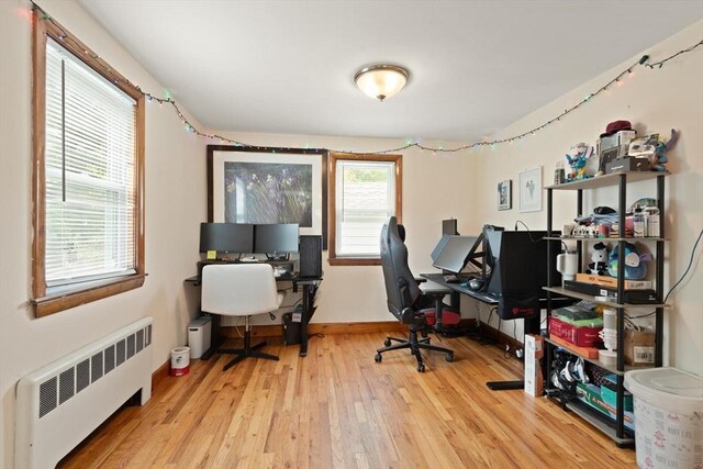 82 Brickel Rd, Stoughton, MA 02072 - office area featuring radiator, hardwood / wood-style flooring, and baseboards