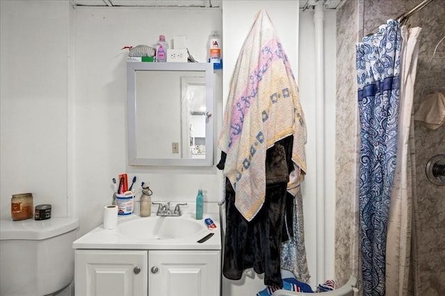 39 Worcester St, Southbridge, MA 01550 - full bathroom featuring vanity, toilet, and a shower with shower curtain