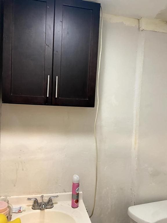 39 Worcester St, Southbridge, MA 01550 - half bath featuring a sink and toilet