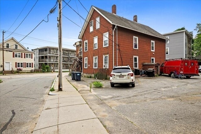 39 Worcester St, Southbridge, MA 01550 - view of home's exterior featuring a chimney