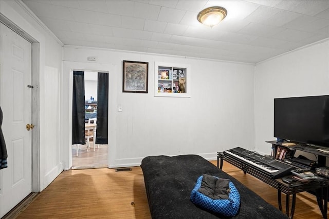39 Worcester St, Southbridge, MA 01550 - living area featuring ornamental molding, wood finished floors, and baseboards