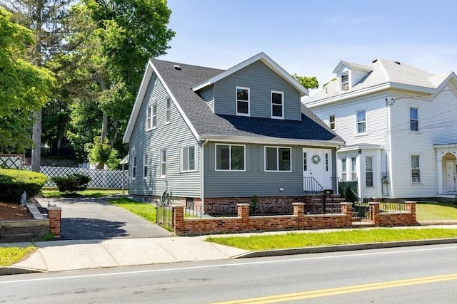 63 Lincoln Ave, Saugus, MA 01906 - view of front of house featuring a shingled roof