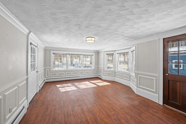 entrance foyer with a wealth of natural light, dark wood-style floors, and baseboard heating