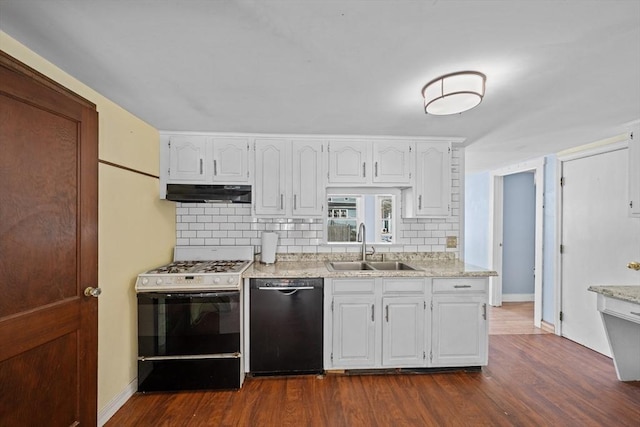 kitchen featuring dark wood-type flooring, under cabinet range hood, a sink, gas range oven, and dishwasher