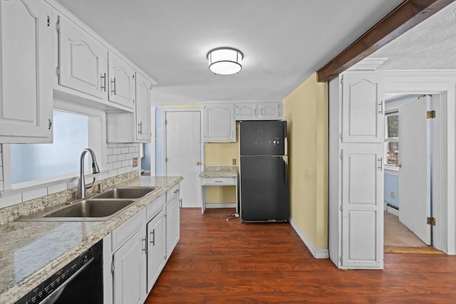 kitchen with black appliances, a sink, dark wood-style floors, white cabinets, and light countertops