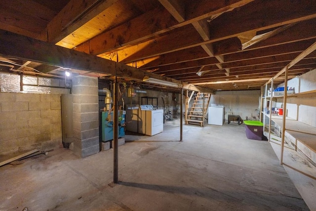 unfinished basement with a heating unit and stairs