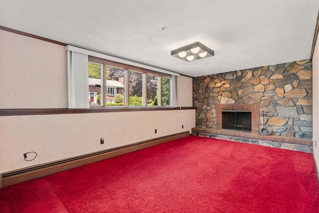 unfurnished living room with baseboard heating, carpet, and a stone fireplace