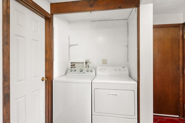laundry room featuring washer and clothes dryer