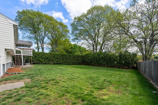 view of yard featuring stairway