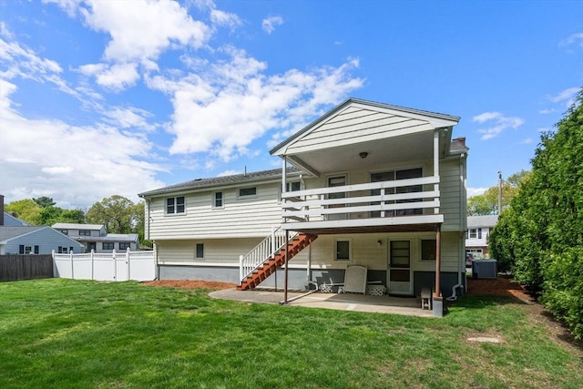 back of house featuring a patio, stairway, and central air condition unit