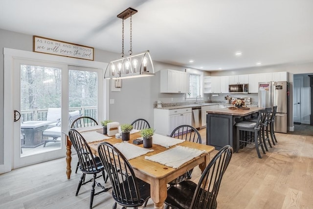 115 Kiahs Way, Sandwich, MA 02537 - dining space with healthy amount of natural light, light wood-style floors, and recessed lighting