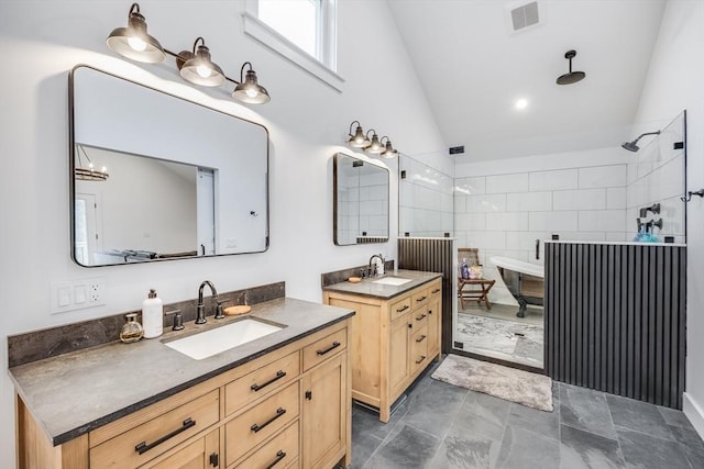 115 Kiahs Way, Sandwich, MA 02537 - bathroom featuring a walk in shower, two vanities, a soaking tub, and high vaulted ceiling