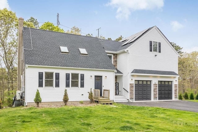 115 Kiahs Way, Sandwich, MA 02537 - view of front of house featuring asphalt driveway, a front yard, a garage, and a shingled roof