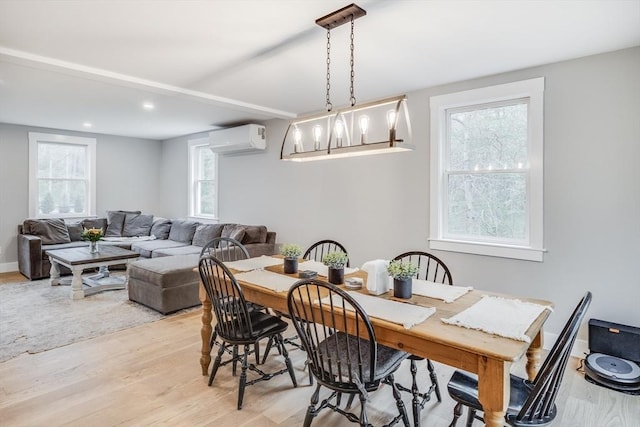 115 Kiahs Way, Sandwich, MA 02537 - dining area with a wall mounted AC, light wood-type flooring, and recessed lighting