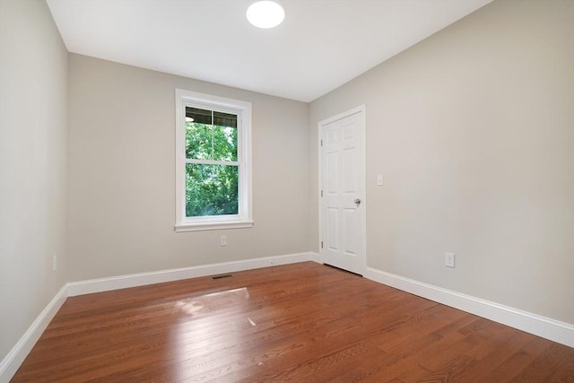 41 Adams St, Fairhaven, MA 02719 - empty room with wood finished floors