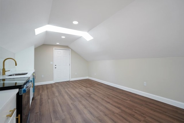 41 Adams St, Fairhaven, MA 02719 - additional living space featuring vaulted ceiling, dark wood-style flooring, recessed lighting, and a skylight