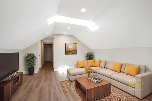 41 Adams St, Fairhaven, MA 02719 - living room with a skylight, wood finished floors, and vaulted ceiling