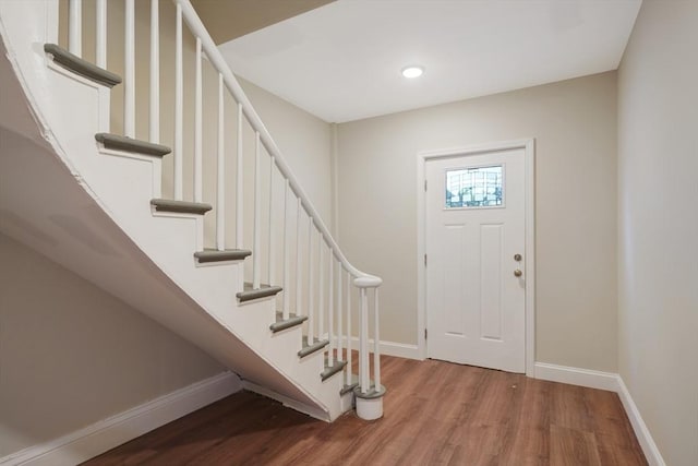 41 Adams St, Fairhaven, MA 02719 - entryway with wood finished floors, stairs, and recessed lighting