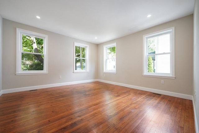41 Adams St, Fairhaven, MA 02719 - unfurnished room featuring healthy amount of natural light, hardwood / wood-style floors, and recessed lighting