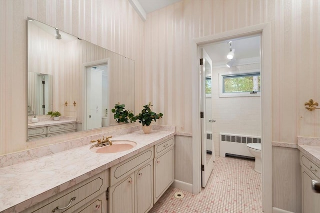 181 Thayer Farms Rd, Attleboro, MA 02703 - bathroom featuring radiator, vanity, toilet, tile patterned floors, and wallpapered walls