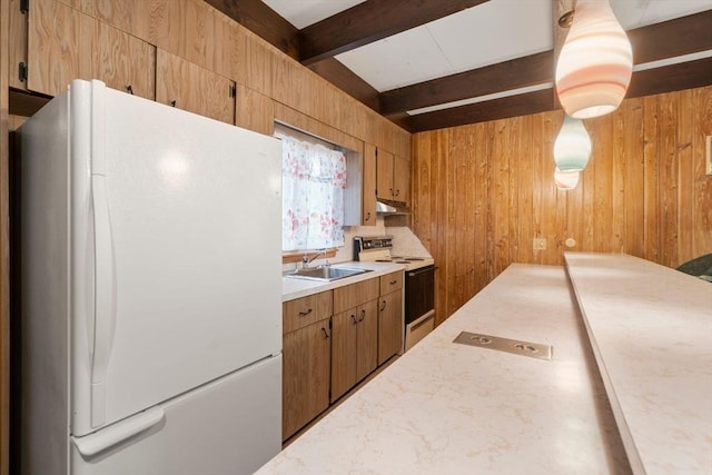 181 Thayer Farms Rd, Attleboro, MA 02703 - kitchen with freestanding refrigerator, range with electric stovetop, wood walls, light countertops, and a sink