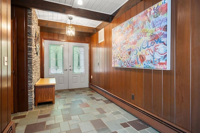 181 Thayer Farms Rd, Attleboro, MA 02703 - entrance foyer featuring baseboard heating, beam ceiling, wood walls, and french doors