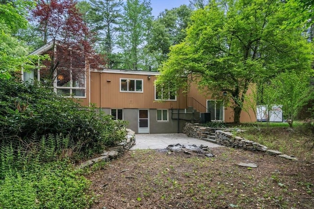 181 Thayer Farms Rd, Attleboro, MA 02703 - rear view of house with a patio and cooling unit