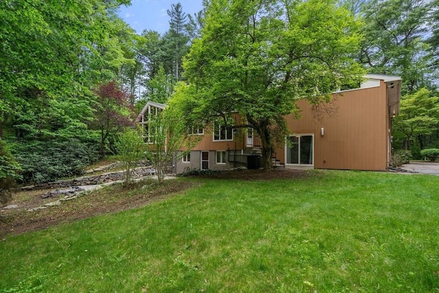 181 Thayer Farms Rd, Attleboro, MA 02703 - rear view of property featuring a yard and cooling unit