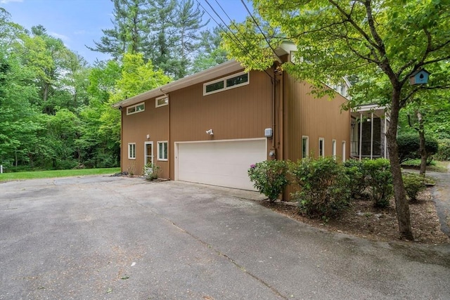 181 Thayer Farms Rd, Attleboro, MA 02703 - view of home's exterior featuring driveway and an attached garage