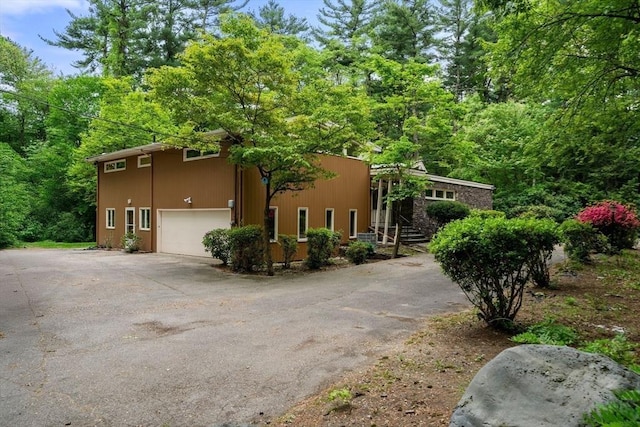 181 Thayer Farms Rd, Attleboro, MA 02703 - view of front of house featuring asphalt driveway and a garage