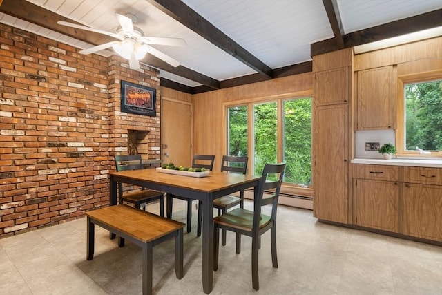 181 Thayer Farms Rd, Attleboro, MA 02703 - dining space featuring brick wall, beam ceiling, ceiling fan, and wooden walls