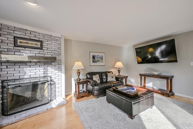 9 Country Club Ln Unit A, Milford, MA 01757 - living room with wood finished floors and a fireplace