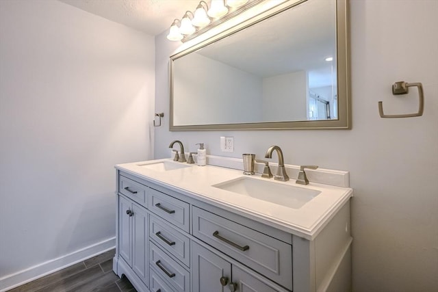 9 Country Club Ln Unit A, Milford, MA 01757 - full bathroom with double vanity and wood finished floors