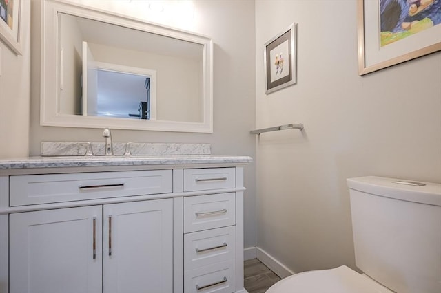 9 Country Club Ln Unit A, Milford, MA 01757 - bathroom featuring vanity and wood finished floors