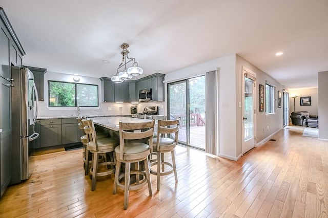 9 Country Club Ln Unit A, Milford, MA 01757 - dining area with light wood finished floors and recessed lighting
