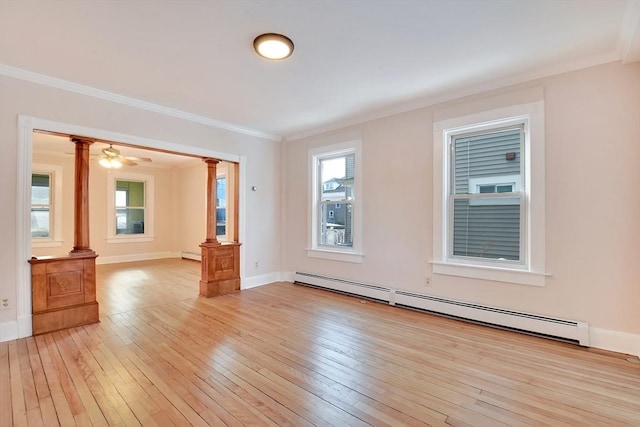 empty room featuring ornamental molding, ceiling fan, light hardwood / wood-style floors, and a baseboard radiator