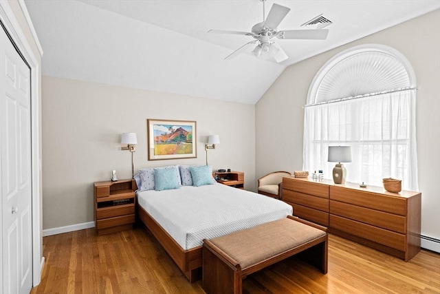 11 Quashnet Woods Dr, Mashpee, MA 02649 - bedroom featuring vaulted ceiling, light wood-style flooring, a closet, and ceiling fan