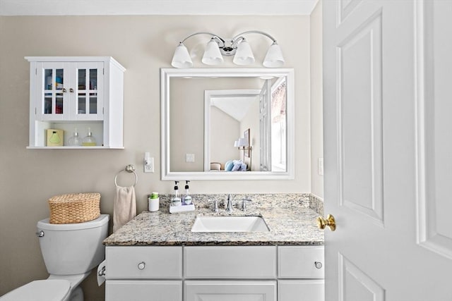11 Quashnet Woods Dr, Mashpee, MA 02649 - half bathroom with vanity and toilet