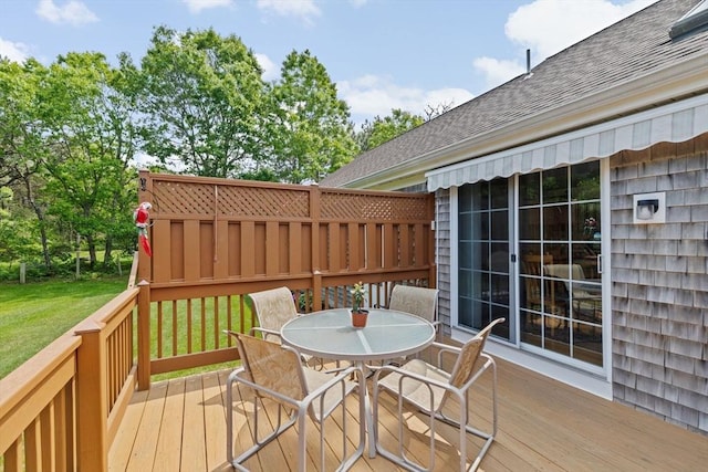 11 Quashnet Woods Dr, Mashpee, MA 02649 - wooden deck featuring outdoor dining area and a lawn
