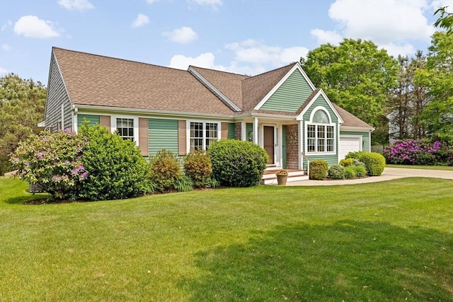 11 Quashnet Woods Dr, Mashpee, MA 02649 - view of front of property featuring a front yard, driveway, an attached garage, and a shingled roof