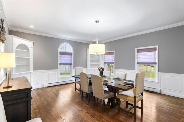 dining area with crown molding, baseboard heating, and dark wood-type flooring