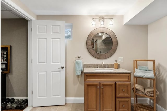 bathroom with vanity and tile patterned floors