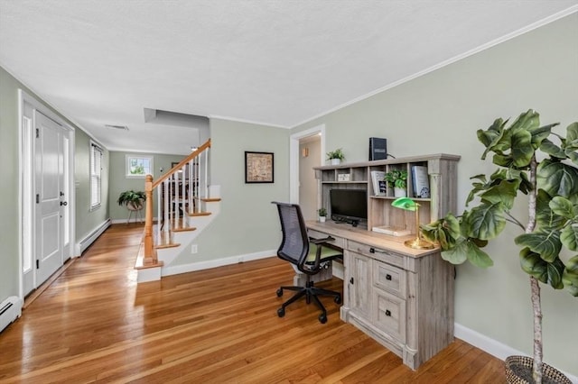 35 Crest Rd, Lynnfield, MA 01940 - home office with a baseboard radiator, light wood finished floors, and ornamental molding