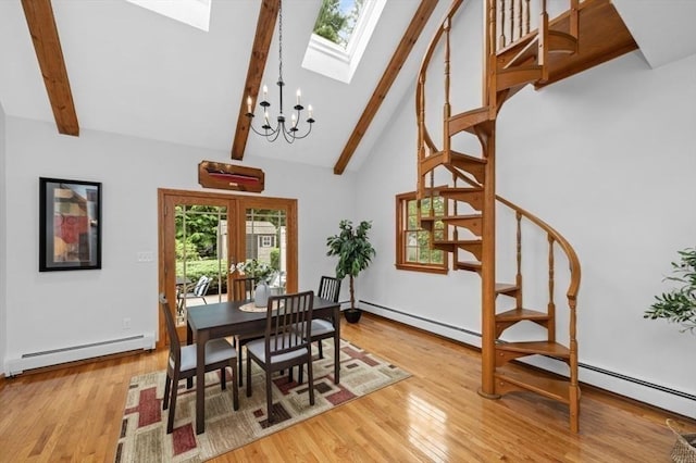 35 Crest Rd, Lynnfield, MA 01940 - dining space with a baseboard radiator, a skylight, light wood finished floors, beam ceiling, and high vaulted ceiling