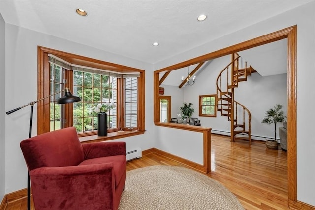 35 Crest Rd, Lynnfield, MA 01940 - sitting room featuring a baseboard heating unit, healthy amount of natural light, wood finished floors, recessed lighting, and vaulted ceiling
