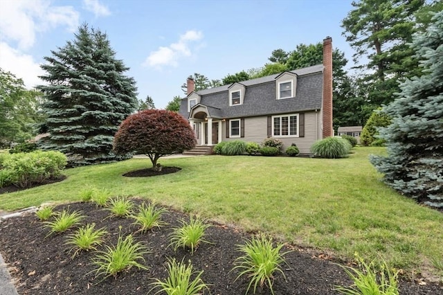35 Crest Rd, Lynnfield, MA 01940 - colonial inspired home with a chimney, a front yard, and a gambrel roof
